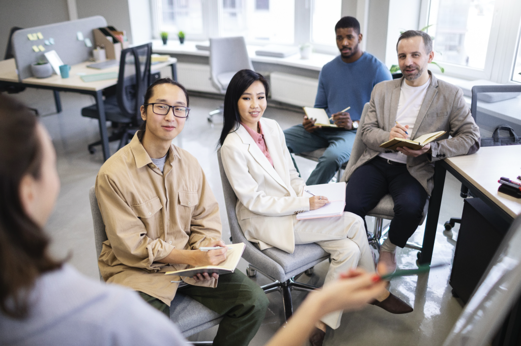 Leadership team reviewing corporate reputation during capital raising and an issue response plan