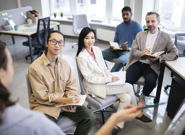 Leadership team reviewing corporate reputation during capital raising and an issue response plan