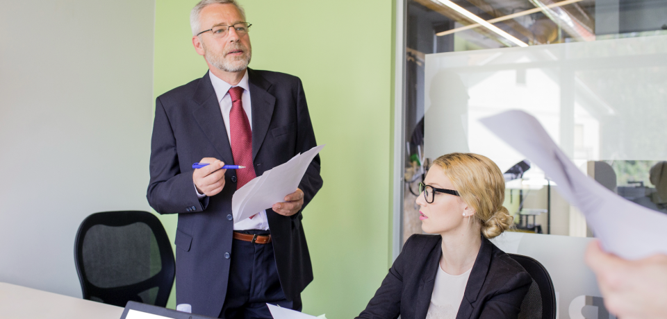 CEO and CFO rehearsing investor presentation preparation with an adviser